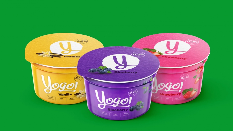 Three Yogo yogurt cups in different flavors with colorful packaging design, showcasing a fresh and modern brand identity for dairy products.