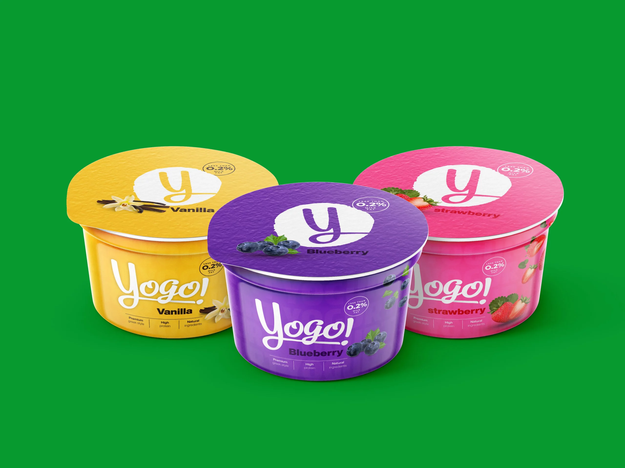 Three Yogo yogurt cups in different flavors with colorful packaging design, showcasing a fresh and modern brand identity for dairy products.